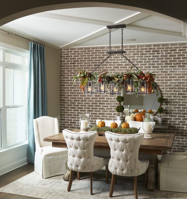 Illuminate and decorate your dining room table for holiday meals.