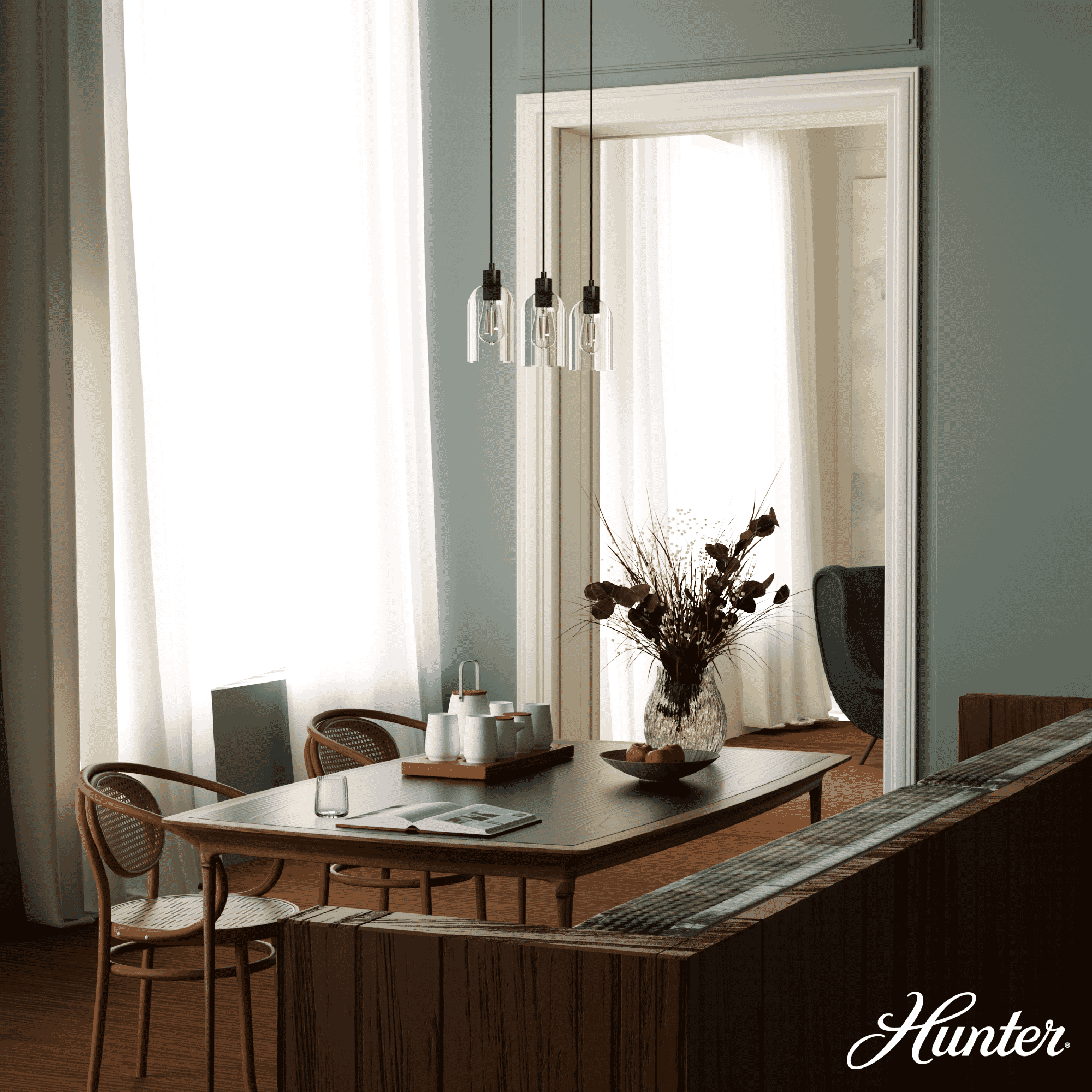 Hunter Lochmeade Clear Seeded Glass 3-Light Linear Pendant Cluster in Noble Bronze