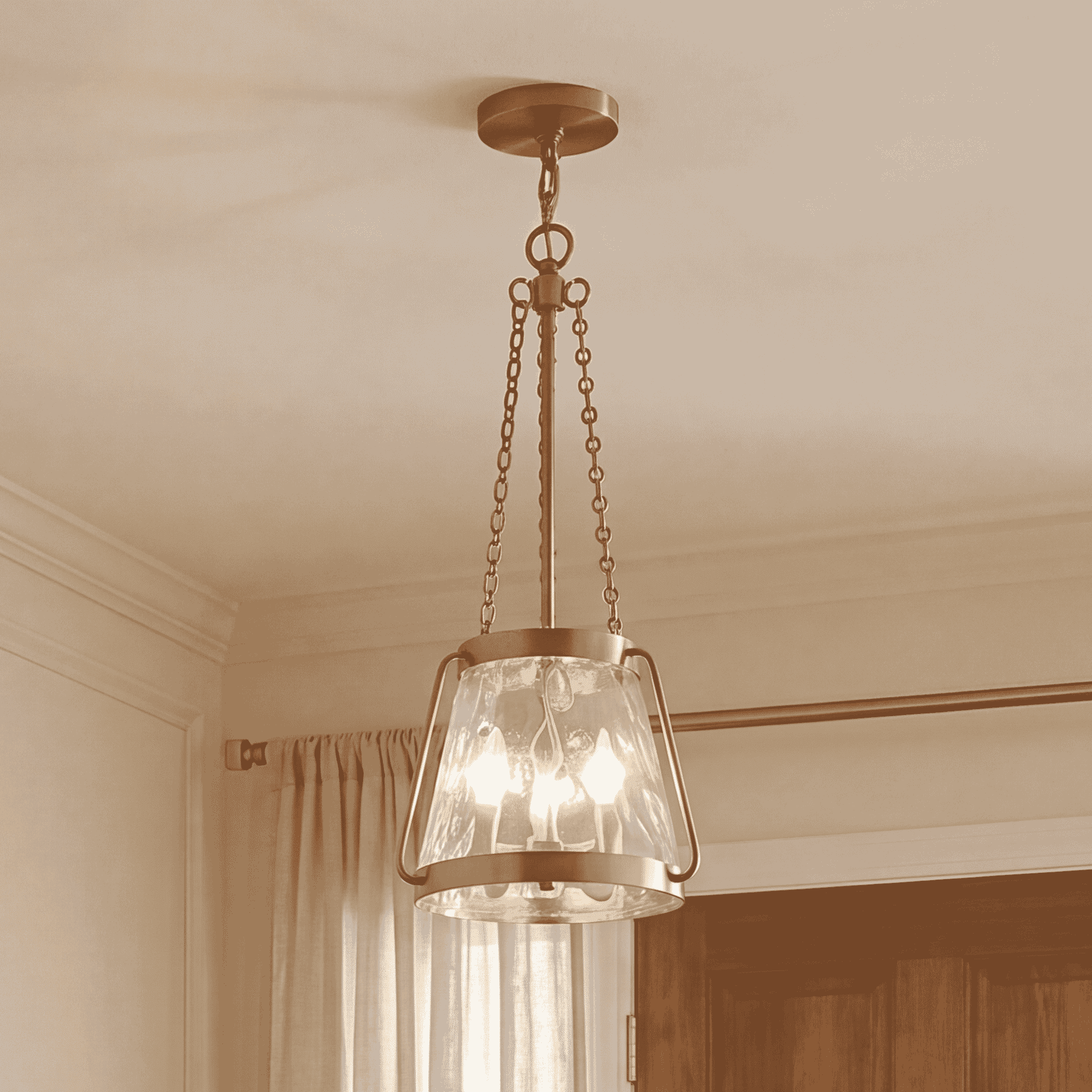 Warm Brass Three Light Pendant from the Crawford Collection