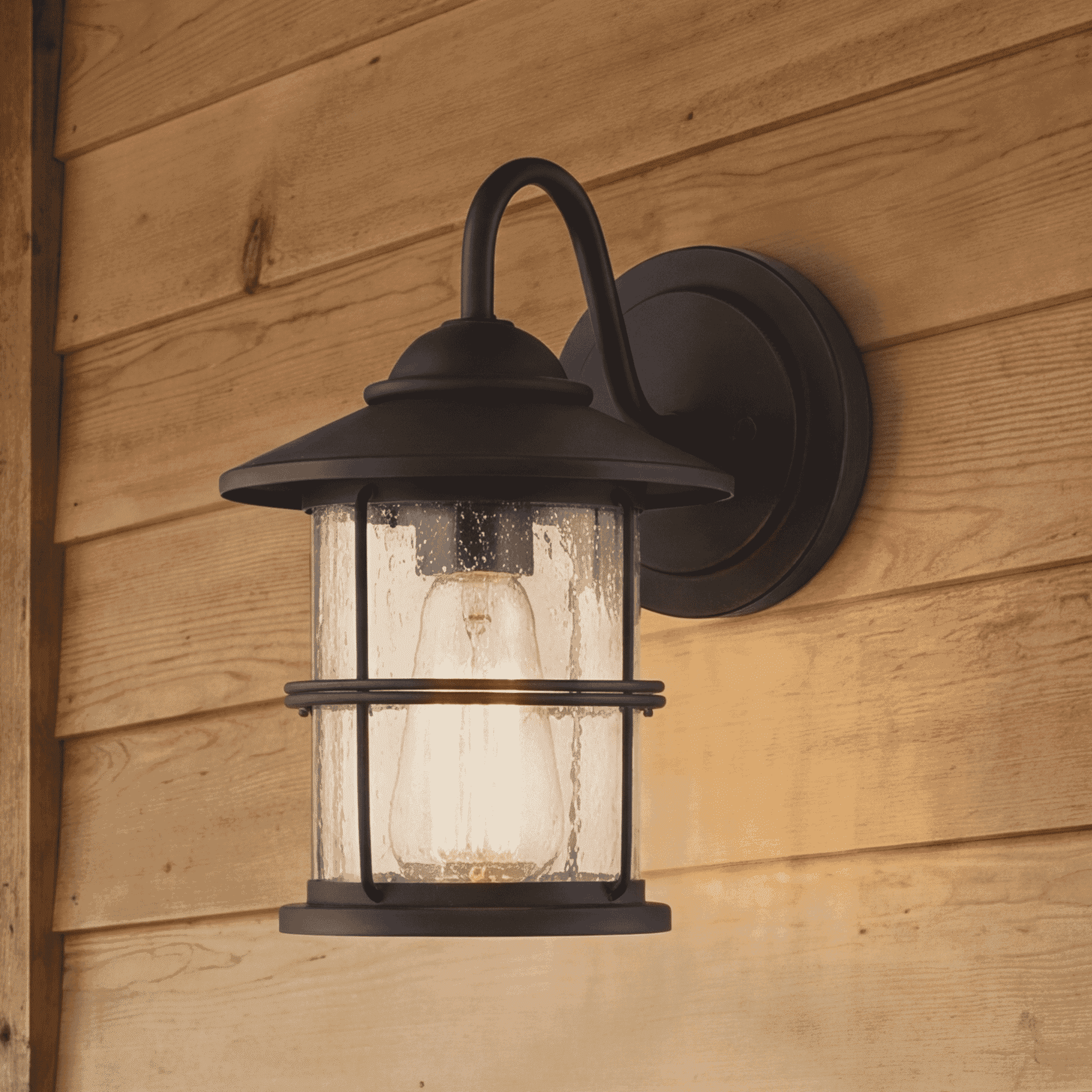 Trade Winds Lighting 1-Light Wall Sconce In Matte Black