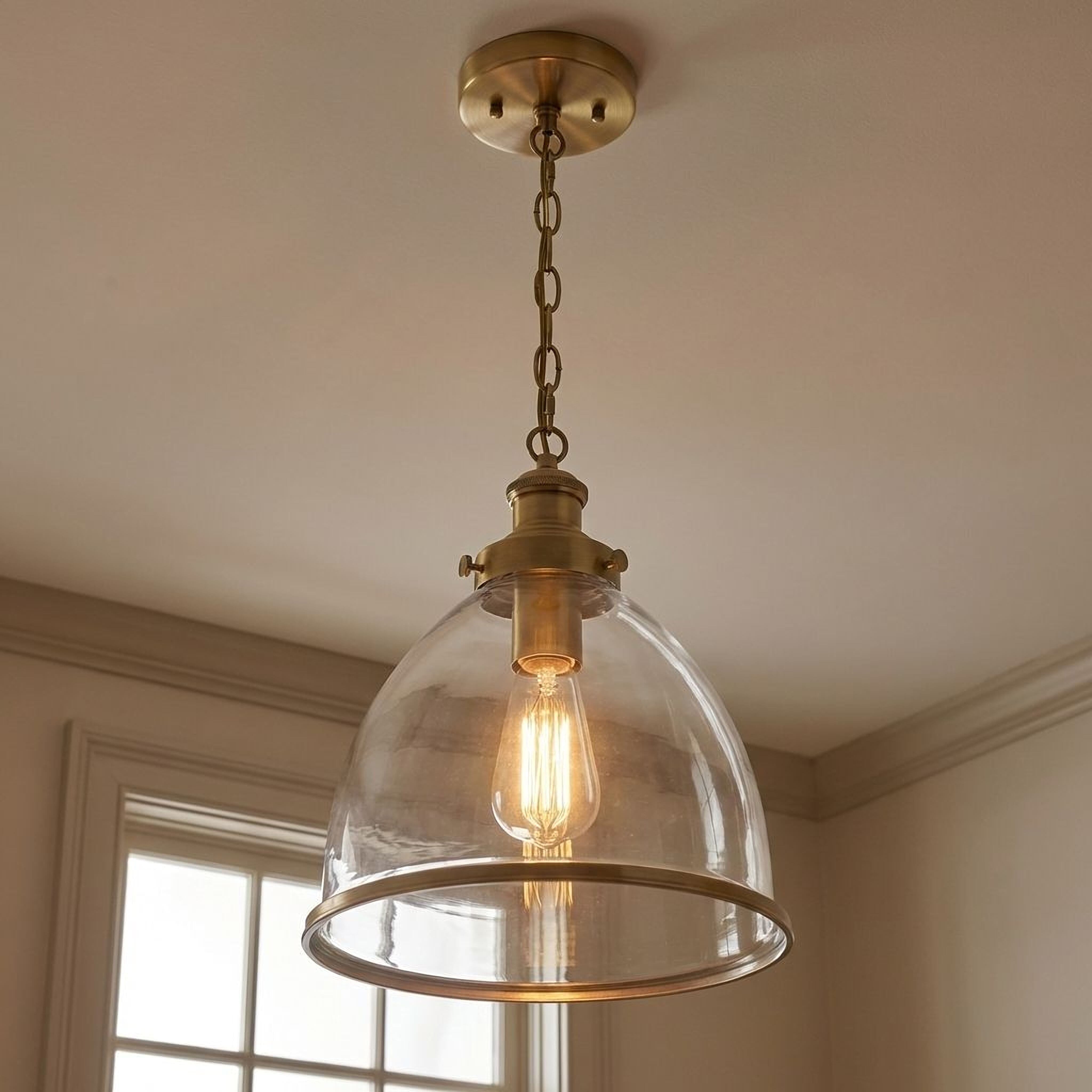 Trade Winds Henry 1-Light Pendant in Natural Brass