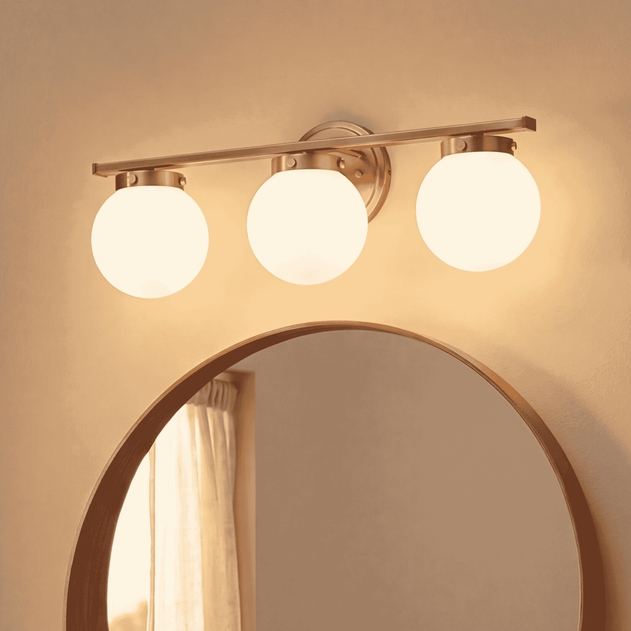 Trade Winds Antoinette 3-Light 24" Bathroom Vanity Light in Natural Brass