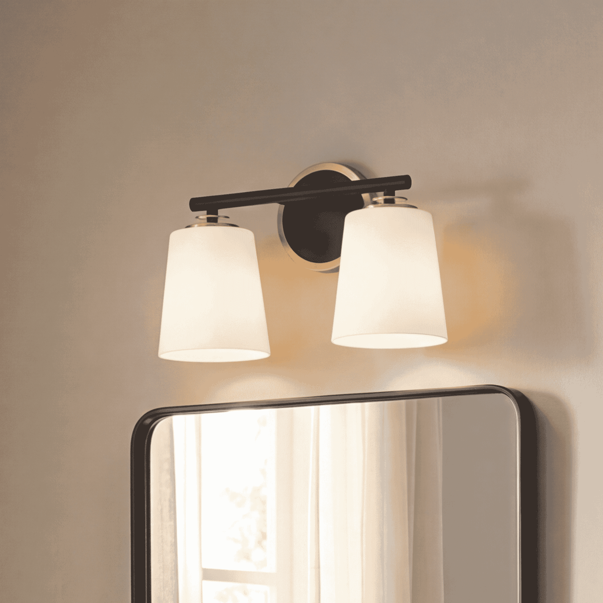 Trade Winds Nell 2-Light Bathroom Vanity Light in Matte Black and Natural Brass
