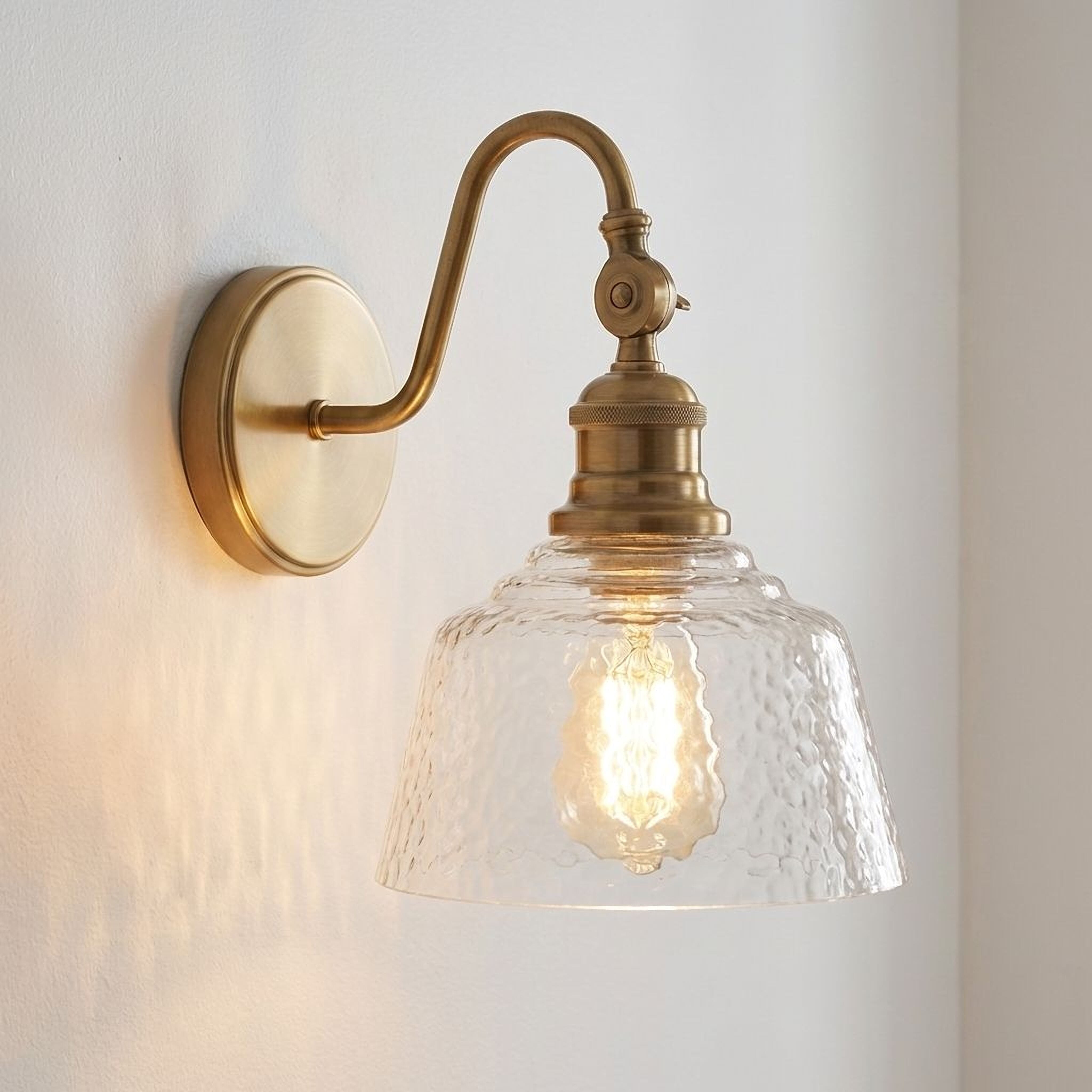 Trade Winds Finn 1-Light Wall Sconce in Natural Brass
