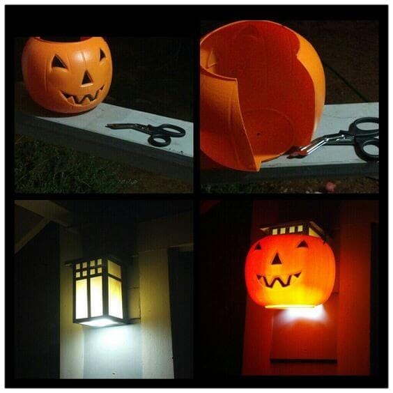Cut a plastic jack-o-lantern bucket and fit it over your porch light for a bit of Halloween fun. Learn more on LightsOnline.com Blog.