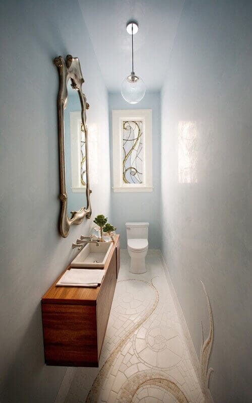 A pendant like the Sonneman Bubbles is a great choice for slim powder rooms. Photo credit: Contemporary Powder Room by San Francisco Interior Designers & Decorators Marsh and Clark Design