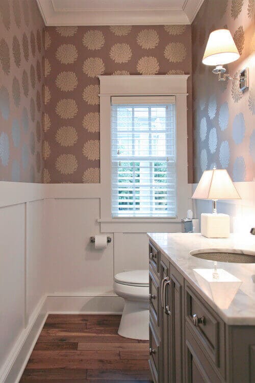 A short, stout accent lamp like the House of Troy Scatchard is an intriguing powder room lighting idea. Photo credit: Traditional Powder Room by Grandville Interior Designers & Decorators Dwellings