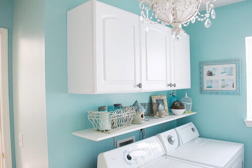 Add a crystal-adorned light to your laundry room! Photo credit: Eclectic Laundry Room